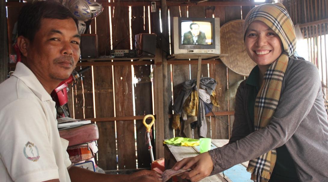 A Projects Abroad intern facilitates a loan while gaining micro-finance work experience in Cambodia An intern works with local entrepreneurs as part of her Micro-finance placement in Cambodia